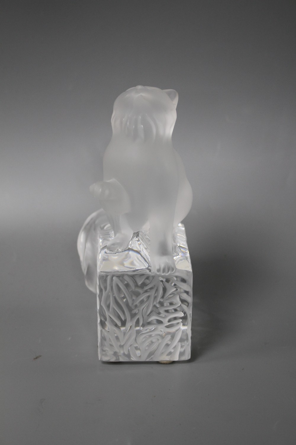 A modern Lalique frosted glass paperweight modelled as a seated cat, height 14.5cm, in original cardboard box,